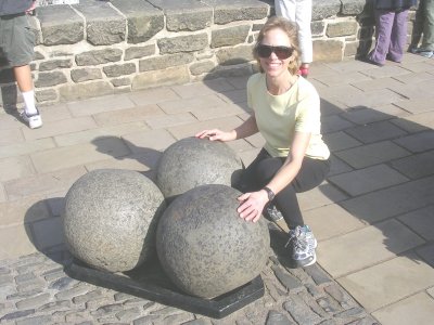 Terry, hugging a Mons Meg Stone.